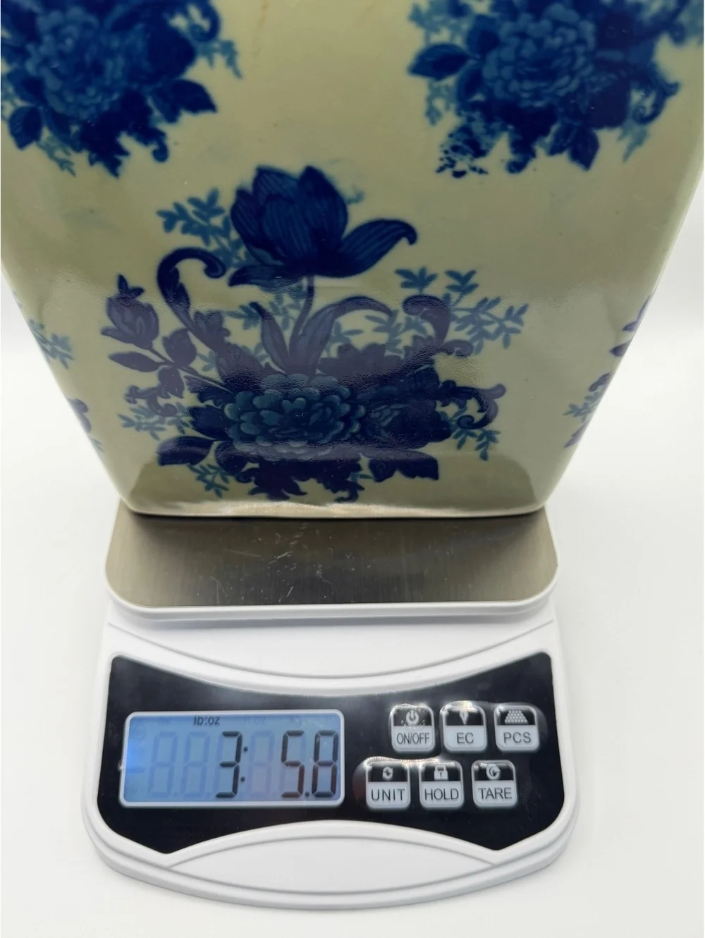 Vintage Ceramic Vase with Blue Floral Design and Dual Handles